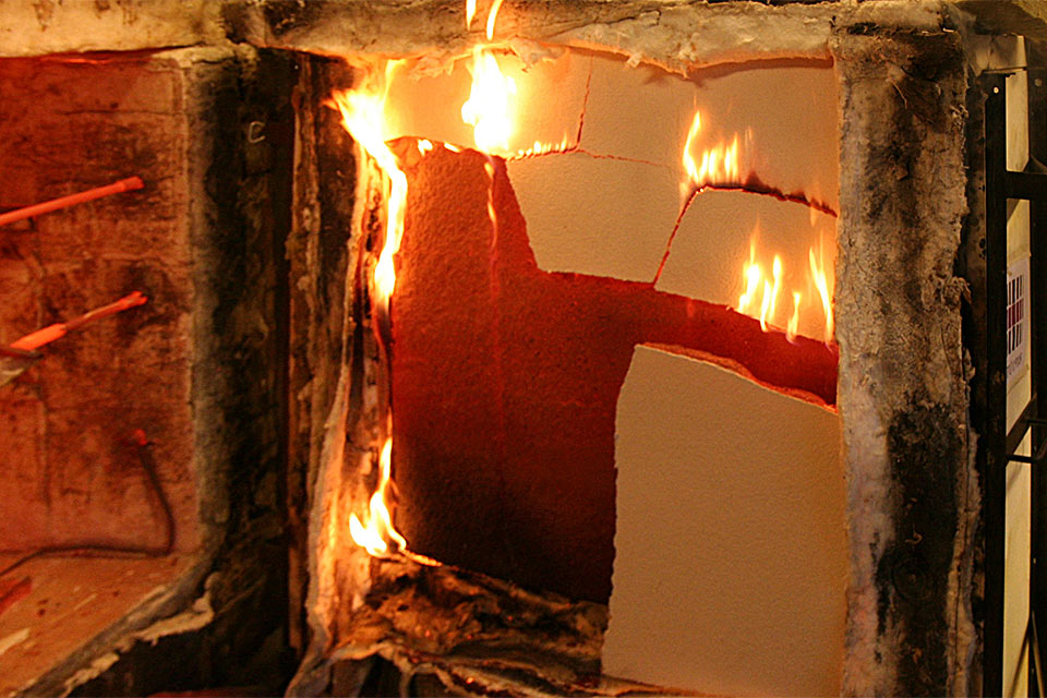 Properties of clay plaster for the fire design of timber structures